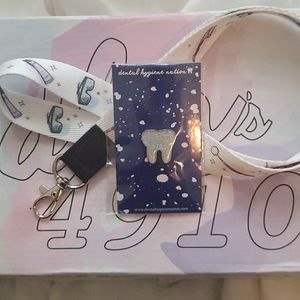 Dental inspired lanyard and tooth pin